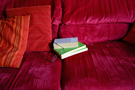 read an old book at homeの写真素材