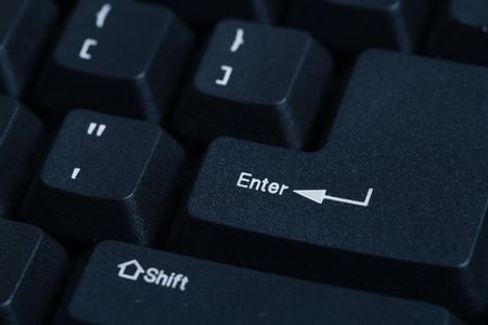 Close up of black modern keyboard - Enter key in focusの写真素材