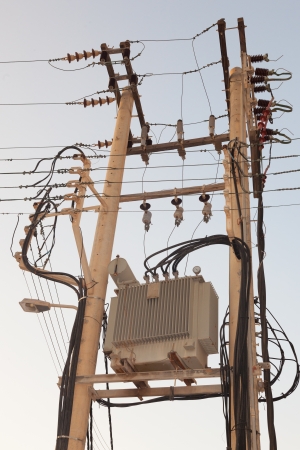 Power pole Tangle of cablesの写真素材