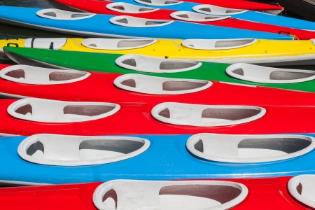 Full frame of colorful kayaks  Close up  Background  Red, blue, green and yellow の写真素材