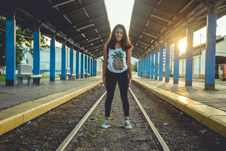 Girl waiting Train