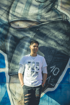 Young man modeling in city