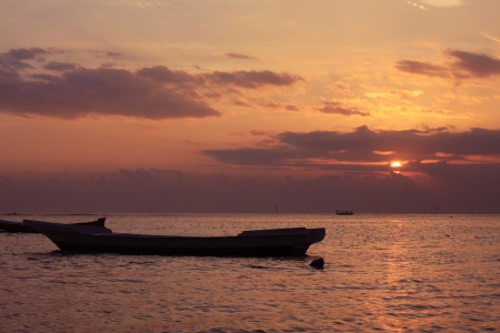 Sunset over Bali s oceanの写真素材