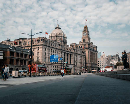 Shanghai City, China Main Street from The Bund during the Summer at low angle displaying the busy streetsのeditorial素材