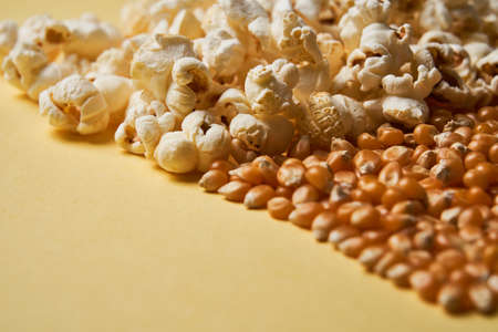 Half Corn and half pop corn background. No body. Copy spaceの写真素材