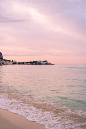 Sunset landscape on a beautiful beach in Mondello, Palermo, Italy.の写真素材