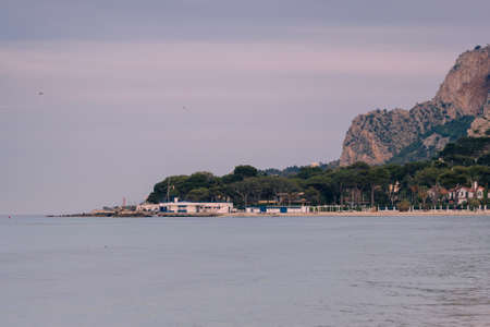 Sunset landscape on a beautiful beach in Mondello, Palermo, Italy.の写真素材