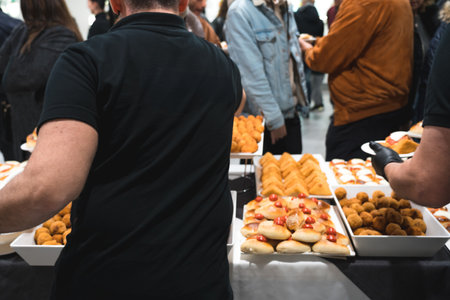 Catering buffet table with a delicious traditional Sicilian meal. Palermo street foodの写真素材