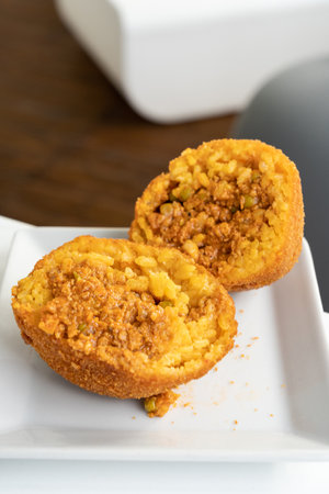 Fried rice ball. Arancino Arancina Arancini - Sicilian Street Food