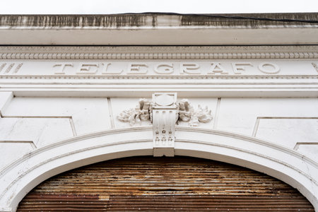 Old telegraph office in Argentina with classical architecture and worn details, showing heritage and decay.の写真素材