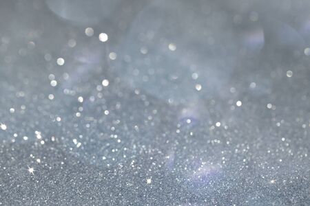 Sparkling Silver Glitter and Light Backgroundの写真素材
