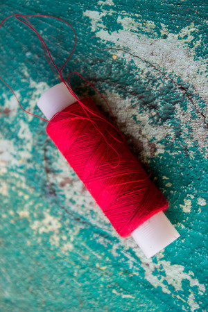 red strings on the old wooden green textures