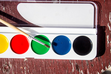colorful paint watercolor on a wooden tableの写真素材