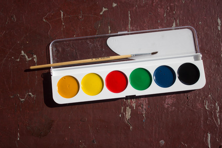 colorful paint watercolor on a wooden tableの写真素材