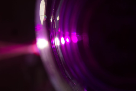 ink dissolve in a glass background abstractionの写真素材