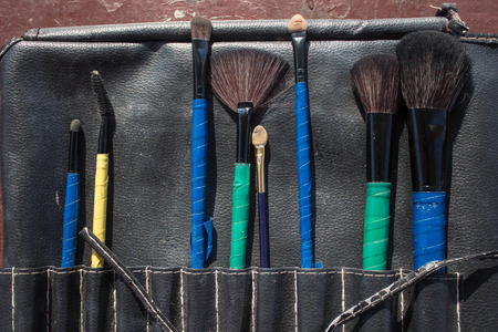 a lot of brushes to paint in the bagの写真素材