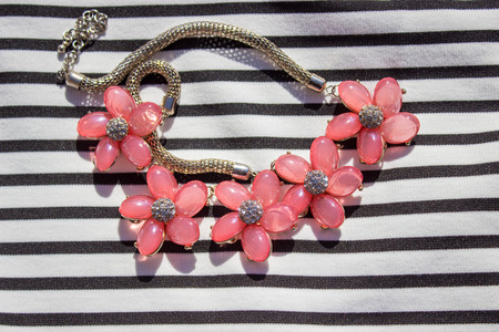 A collage of pink women's clothing and fashion accessories and jewelry chosen for this outfitの写真素材