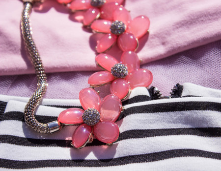 Beautiful ladies fashion collage of items and accessories decorations and rose petalsの写真素材