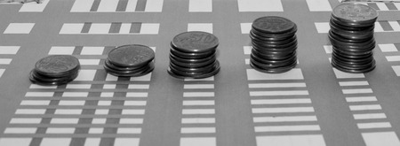 business plan money coins wealth diary and pen for successful projects