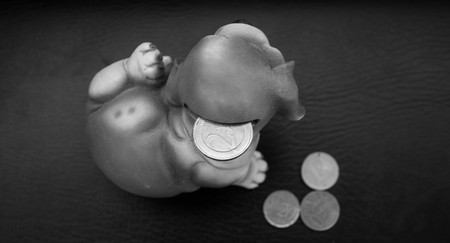 The currency lowering the unemployment rate bankruptcy loan mortgage business sale savingsの写真素材