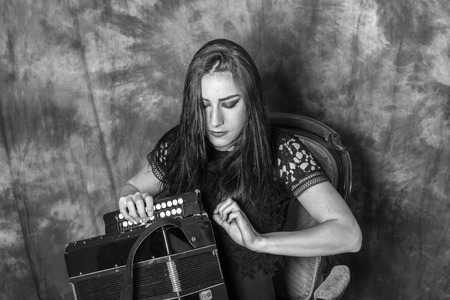 Beautiful sexy girl on the background of stylish eve fashionの写真素材