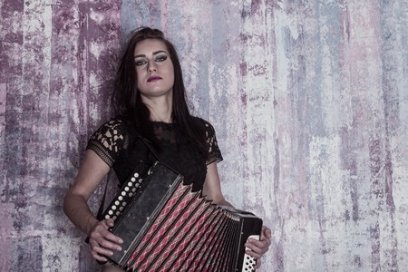 Beautiful sexy girl on the background of stylish eve fashionの写真素材