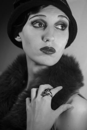 Model in luxury clothes in the likeness of famous Hollywood actress of the twentieth century fashion...