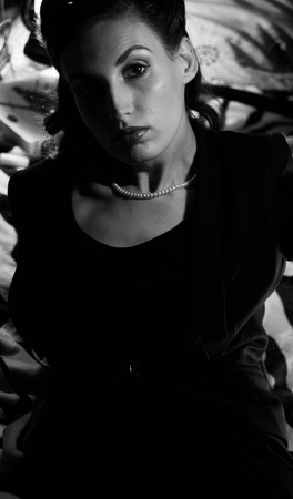 portrait of a beautiful girl in the image celebrity movie star old Hollywood past makeup beauty fashion styleの写真素材