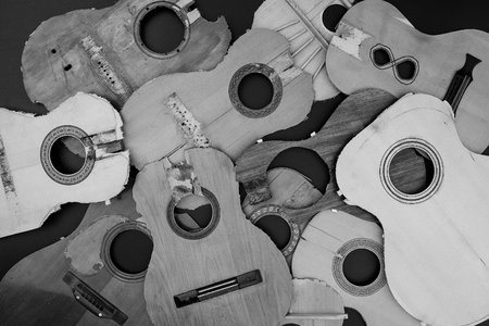 Old parts of broken guitars - Black and White photographyの写真素材