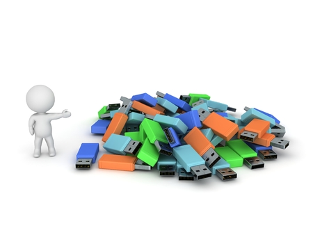 3D Character Showing Pile of USB Sticksの写真素材