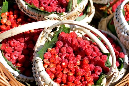 Red raspberrys on little baskets
