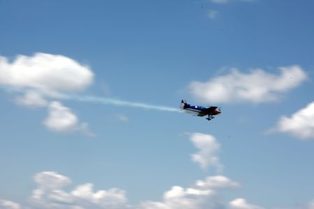 Flight over the blue skyの写真素材
