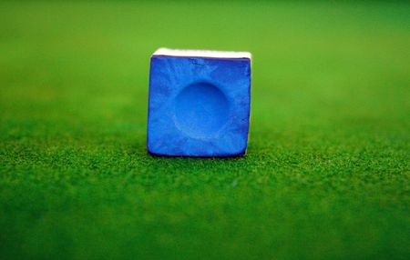 Chalk of pool on green tableの写真素材