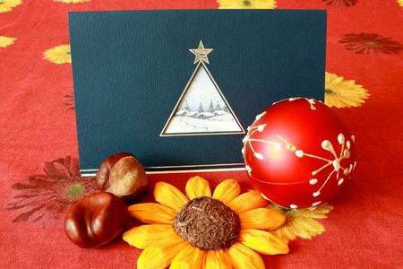 Greeting card with metal pen and some decoration objectsの写真素材