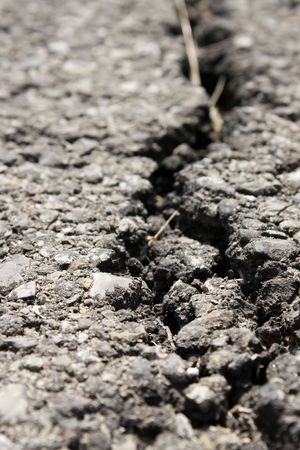 Crack in a bitumen roadの写真素材