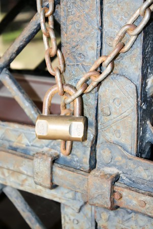 Bologna 09.12.2010 - Chain and lock closed door locked and secure safeのeditorial素材