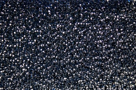 Macro picture of a metallic scrub spongeの写真素材