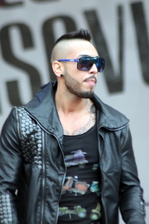 Brasov, Romania - 21.04.2012 - Alex Velea in foreground at Brasov daysのeditorial素材