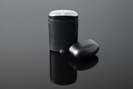 A package of dry deodorant over black background