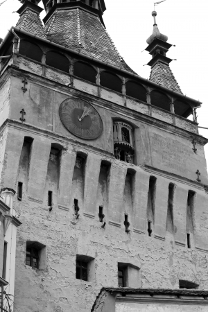 Sighisoara, Romania - 01.04.2013 - Black and white scene of clock tower from Sighisoara citadel