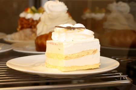 Sweet cake on white plateの写真素材