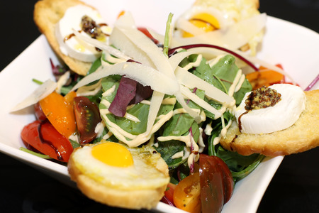 Delicious salad on white bowlの写真素材