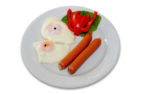 Breakfast with eggs, sausages and tomatoの写真素材