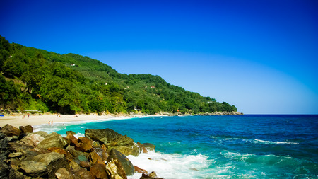 Plaka beach, Pelion, Greece. Sandy beach with rocks, Plaka beach, Pelion, Greeceの写真素材