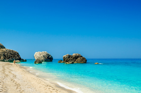 Megali Petra Beach, Lefkada Island, Levkas, Lefkas, Ionian sea, Greece. Wild beach of Megali Petra. A beautiful beach with large rocks in the water.の写真素材
