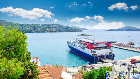 Skiathos town on Skiathos Island, Greece. Beautiful view of the old town with boats in the harbor.の写真素材
