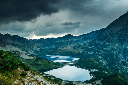 5 lakes valley in Tatra Mountains, Poland. Landscape with lakes and ridges in Poland side of Tatry massifの写真素材