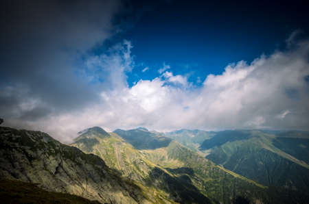 Misty Fagaras Mountains, Romania. Mist over the alps of Transylvania.の写真素材