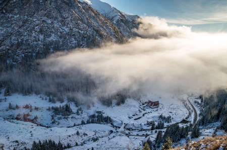 Capra chalet in Fagaras mountains in winter. The ridge of the mountain full of snow. There are one of the beautiful road in the world, Transfagarasanの写真素材