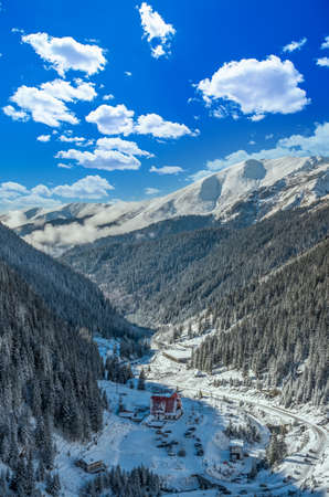 Capra chalet in Fagaras mountains in winter. The ridge of the mountain full of snow. There are one of the beautiful road in the world, Transfagarasanの写真素材